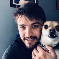 Tristan O'Neil with a Chihuahua dog named Pip S. Queak